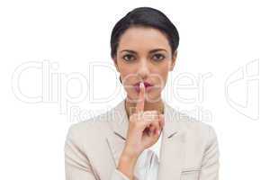 Businesswoman asking for silence