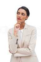 Thoughtful business woman standing
