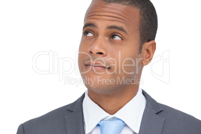 Thoughtful businessman standing