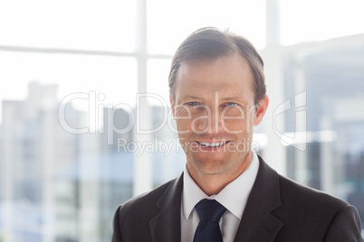 Confident businessman standing