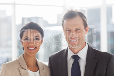 Smiling colleagues in office