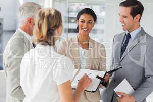 Cheerful business people making an appointment