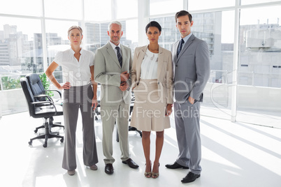 Business people standing in line