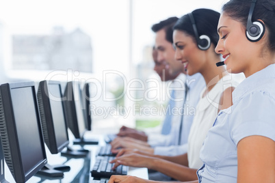 Call centre workers working in line