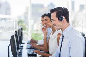 Smiling agent working in a call centre