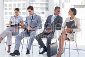 Business people sitting together