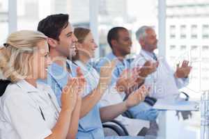 Medical team clapping  their hands
