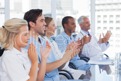 Doctors clapping their hands