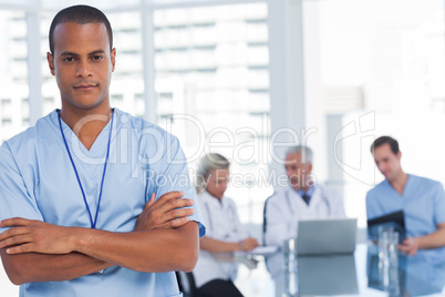 Serious doctor with arms crossed Serious doctor with arms crossed