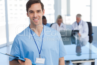 Young doctor holding a file