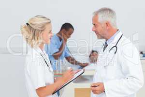 Doctors talking together