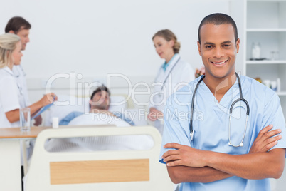 Attractive doctor with arms crossed