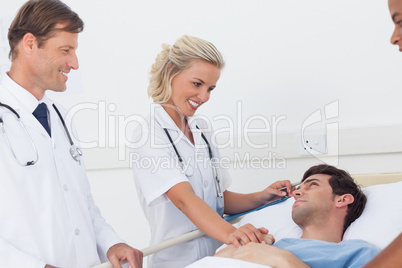 Doctors speaking to a patient