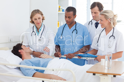 Medical team around the bed of a patient