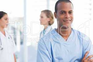 Young doctors with arms crossed