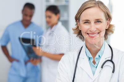 Smiling woman doctor looking at the camera