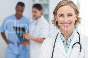Smiling woman doctor looking at the camera