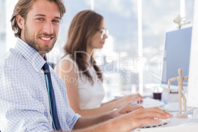 Desingers working at their desk