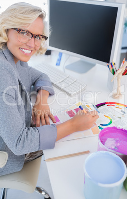 Interior designer looking up from her work