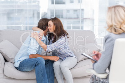 Couple reaching break through in therapy session