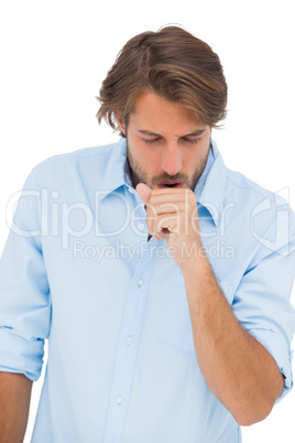 Tanned man coughing
