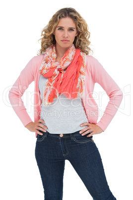 Blonde woman posing with hands on hips