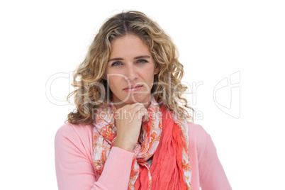 Woman posing with her hand on her chin