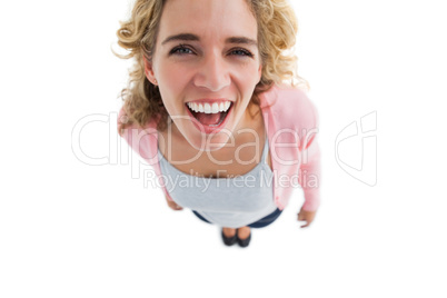 Overhead of laughing woman standing