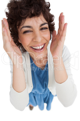 Overhead of smiling woman with hands wide opened