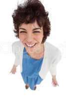 Overhead of cheerful woman standing alone