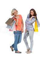 Women doing shopping and holding bags