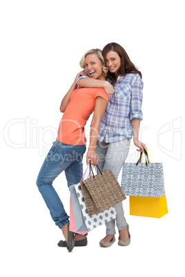 Two women with shopping bags