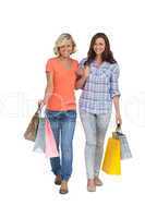 Two cheerful friends with shopping bags