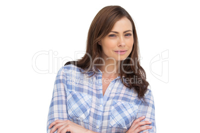 Attractive woman with arms folded