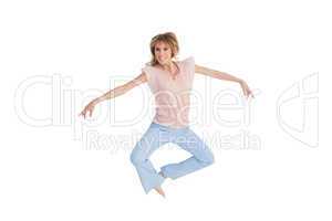 Woman jumping and opening arms