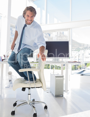 Man surfing his office chair