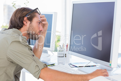 Graphic artist looking at his screen