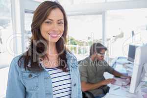 Woman smiling in creative office