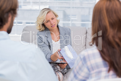 Therapist giving tissue to a woman