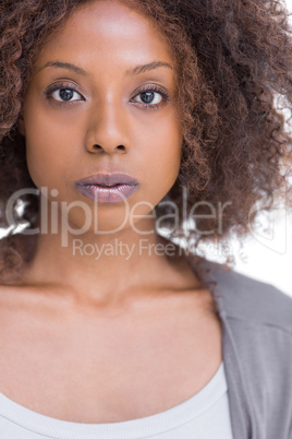 Attractive woman standing with a deep look