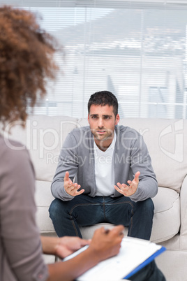 Man speaking to a therapist