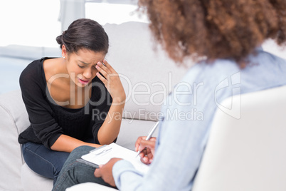 Woman getting depressed in therapy