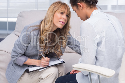 Therapist helping her patient