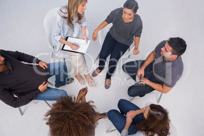Patients listening to each other in group session