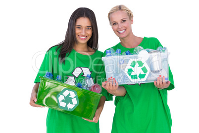 Enivromental activists holding box of recyclables