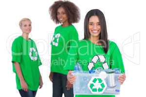 Female activist holding recycling box