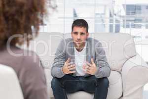 Man telling therapist his problems