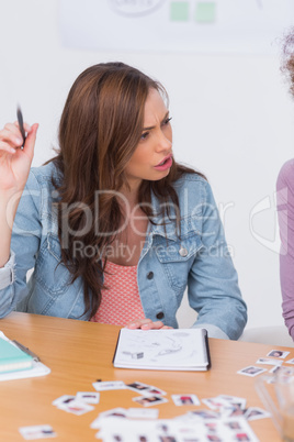 Editor speaking during meeting