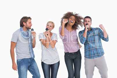 Fun group singing at karaoke
