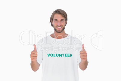 Happy man wearing volunteer tshirt giving thumbs up